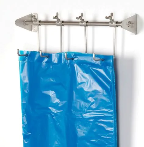 Veggoppheng til engangsforkle på blokk